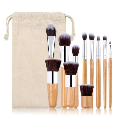 11-Piece Collection of Bamboo Makeup Brushes: beige, light brown wood makeup brush set with drawstring pouch, minimal style