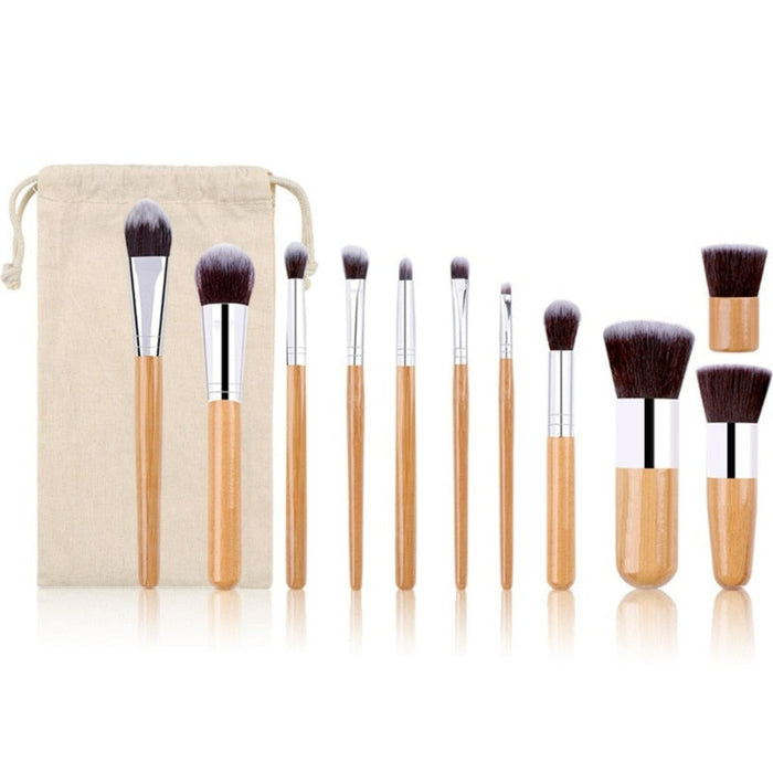 11-Piece Collection of Bamboo Makeup Brushes: beige, light brown wood makeup brush set with drawstring pouch, minimal style