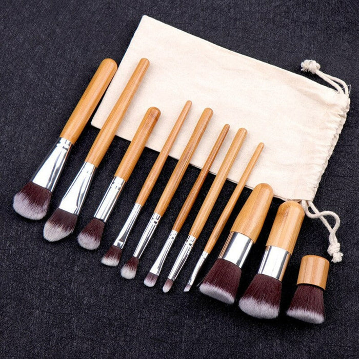 11-Piece Collection of Bamboo Makeup Brushes: beige, light brown wood makeup brush set with drawstring pouch, minimal style
