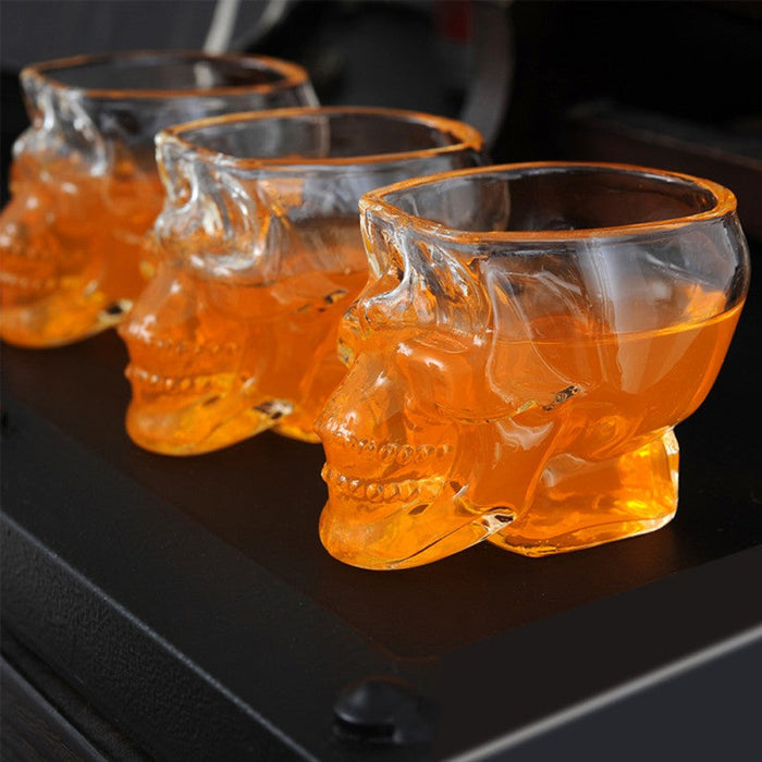 2 Skull Themed Glasses, Set of 2: clear, transparent human skull, novelty gothic style