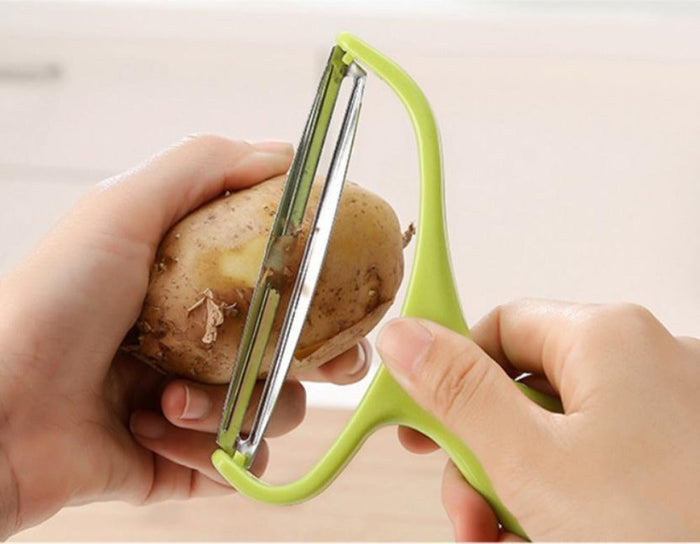 3 Piece Set of Peelers for Fruits and Vegetables: lime green, silver vegetable peeler, minimal style