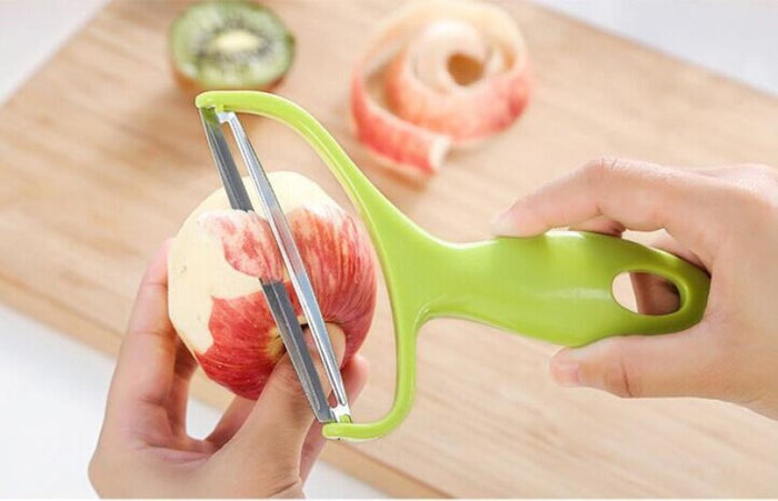 3 Piece Set of Peelers for Fruits and Vegetables: lime green, silver vegetable peeler, minimal style