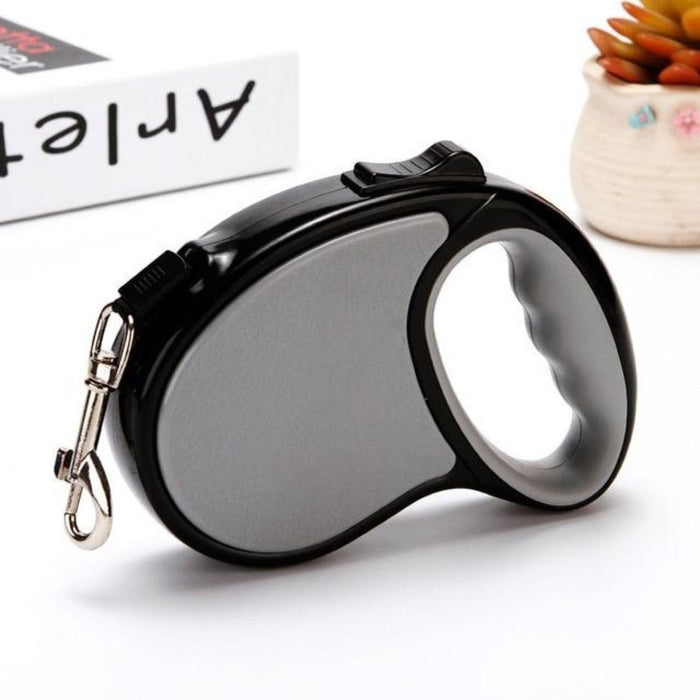 5-Meter Long Retractable Leash for Dogs made of Nylon: black, pink retractable pet leash, minimal product display style