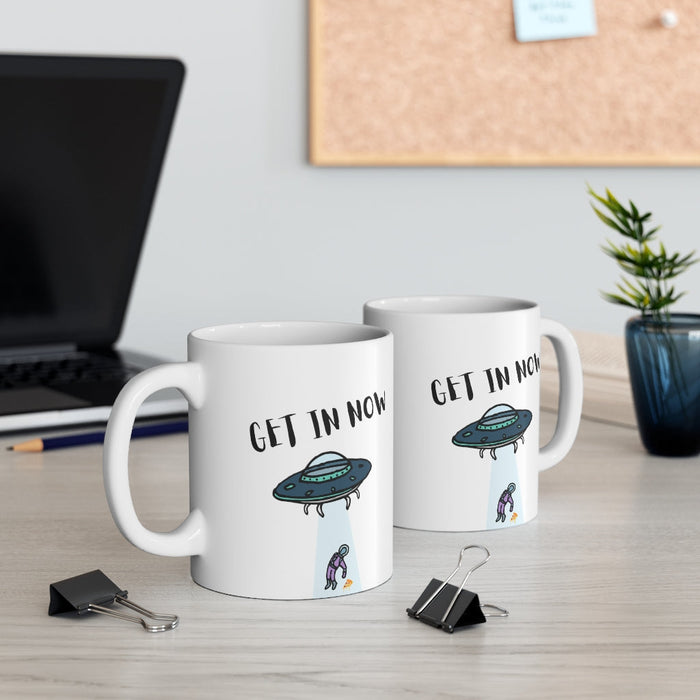 Abduction Extraterrestrial Beverage Mug: white, black UFO abducting a small person, cartoon style