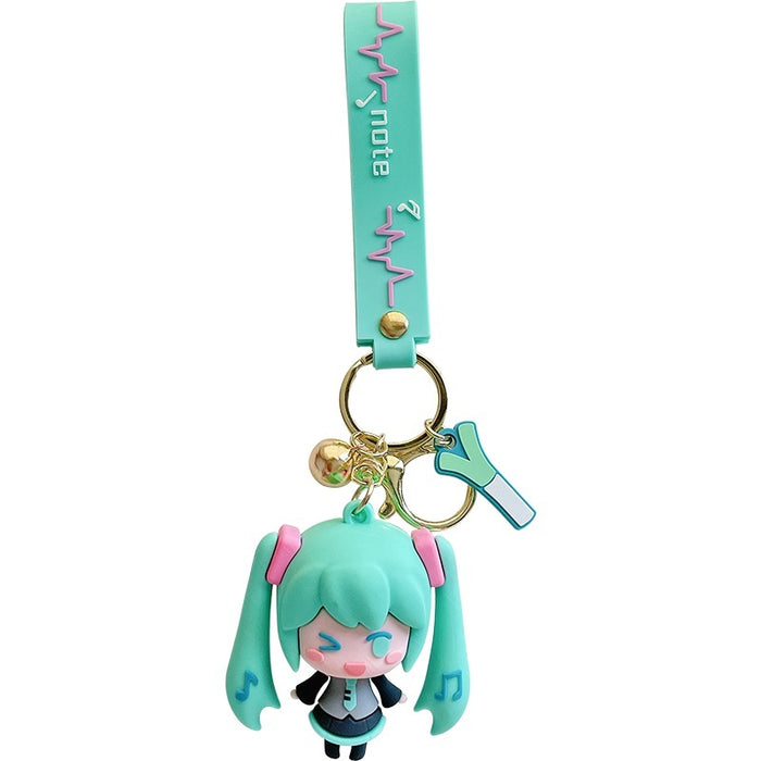 Adorable Miku Keychains with Pastel Charm: light blue, white anime-style girl character with long twin-tail blue hair, kawaii