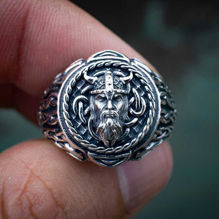 Ancient Nordic Ring: silver, dark gray bearded horned warrior/character, ornate fantasy style