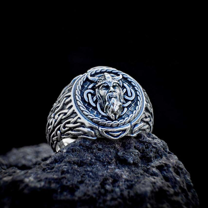 Ancient Nordic Ring: silver, dark gray bearded horned warrior/character, ornate fantasy style