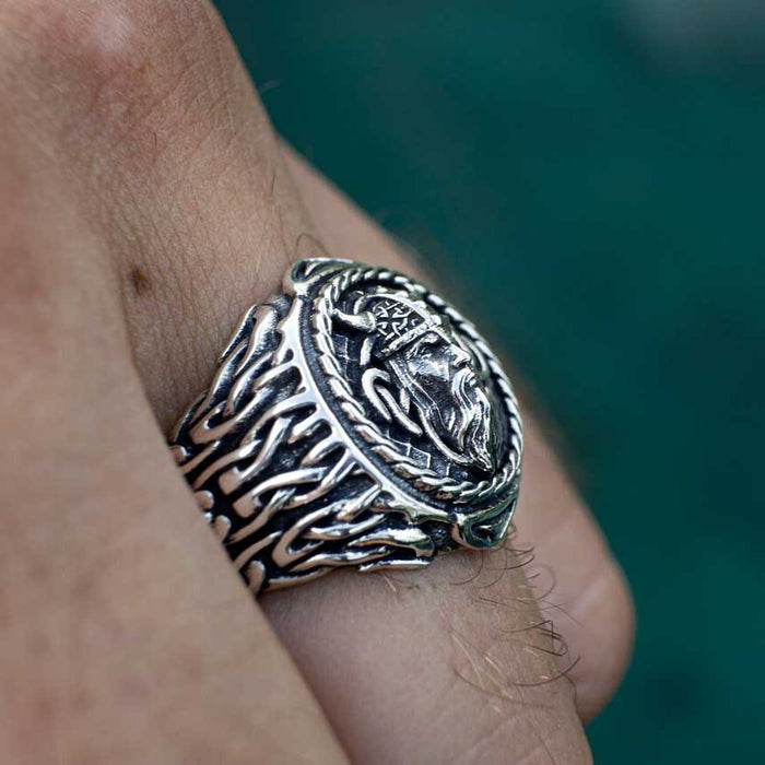 Ancient Nordic Ring: silver, dark gray bearded horned warrior/character, ornate fantasy style