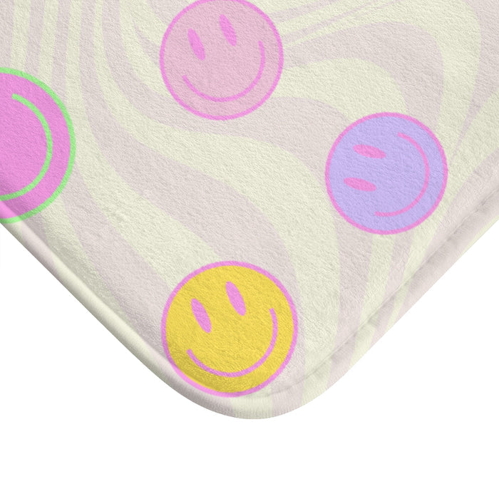 Bath Mat with Happy Faces: off-white, pale pink smiley face theme, playful cartoon style