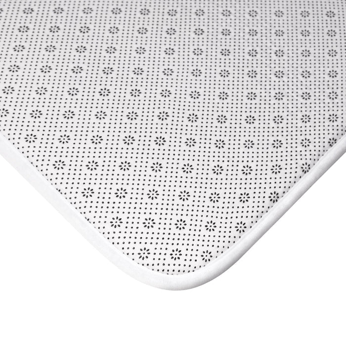Bath Mat with Happy Faces: off-white, pale pink smiley face theme, playful cartoon style