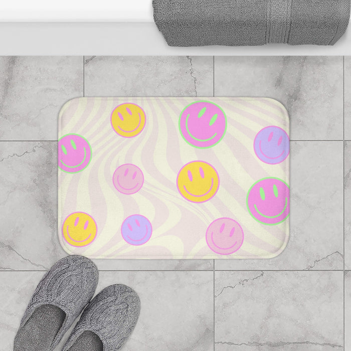 Bath Mat with Happy Faces: off-white, pale pink smiley face theme, playful cartoon style