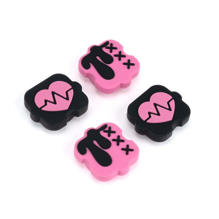Black n Pink Switch Thumb Grips: turquoise blue, coral red cartoon bunny-like character graphic