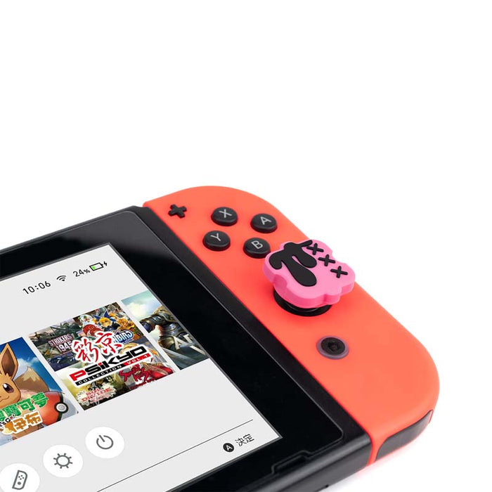 Black n Pink Switch Thumb Grips: turquoise blue, coral red cartoon bunny-like character graphic