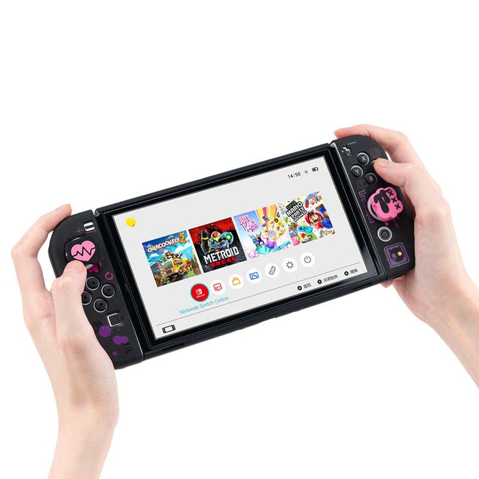 Black n Pink Switch Thumb Grips: turquoise blue, coral red cartoon bunny-like character graphic