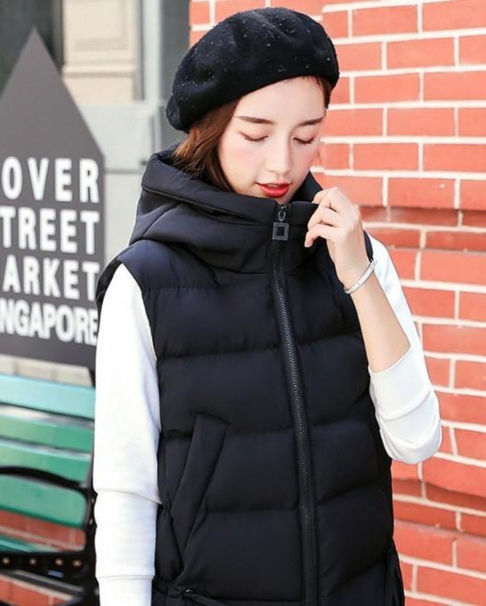 Black Women's Hooded Puffer Vest with Zipper Closure: black hooded puffer vest, casual minimal style