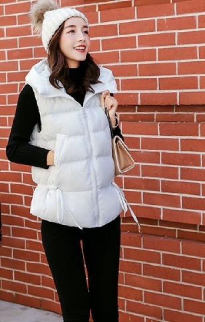 Black Women's Hooded Puffer Vest with Zipper Closure: black hooded puffer vest, casual minimal style