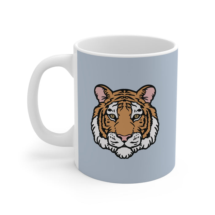Blue Mug with Tiger Logo: light blue-gray, white tiger, cartoon style