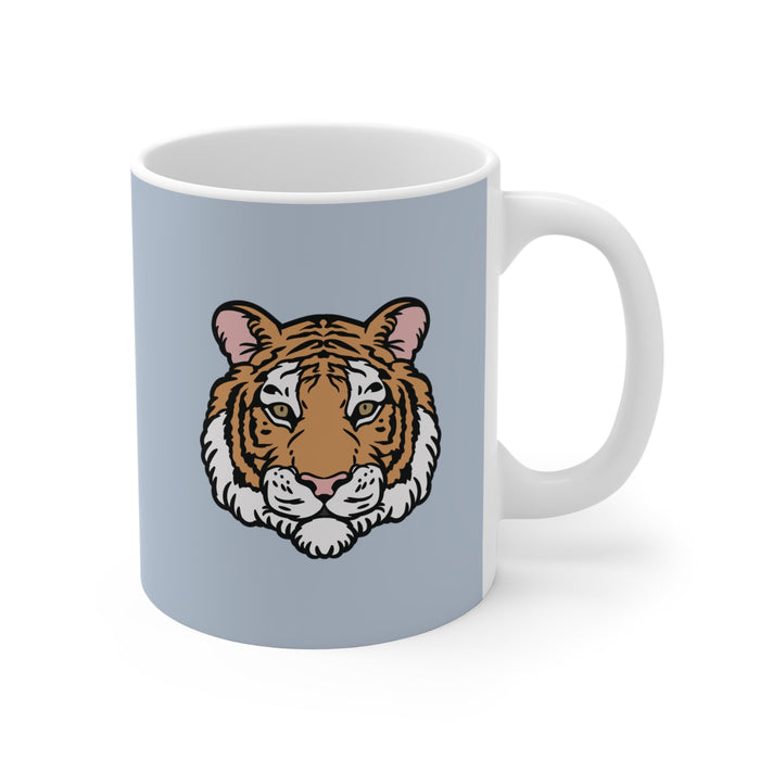 Blue Mug with Tiger Logo: light blue-gray, white tiger, cartoon style