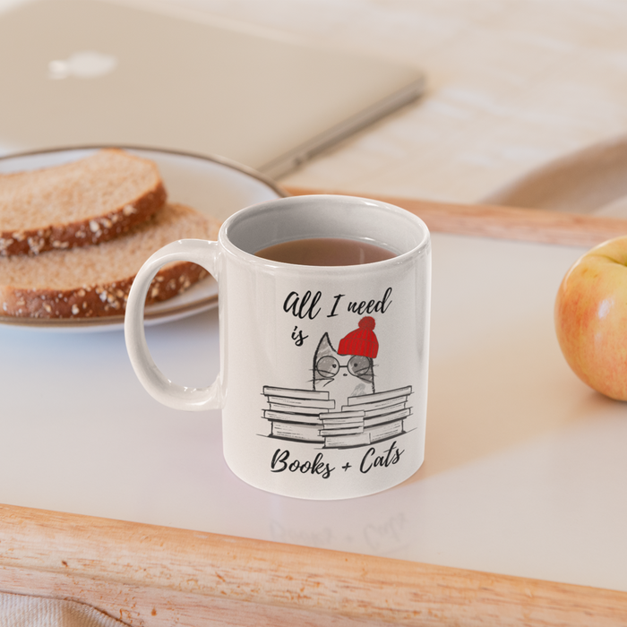 Books and Feline Friends Mug: white, black cat, cartoon style