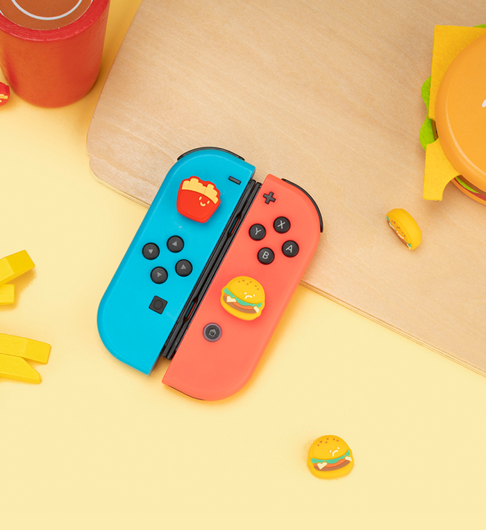 Burger and Fries Switch Thumb Grips: yellow, red hamburger and french fries characters, kawaii cartoon style