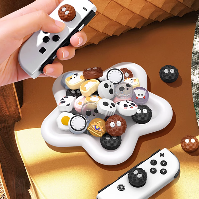 Cat Switch Thumb Grips with Personality: orange, cream cats, kawaii cartoon style