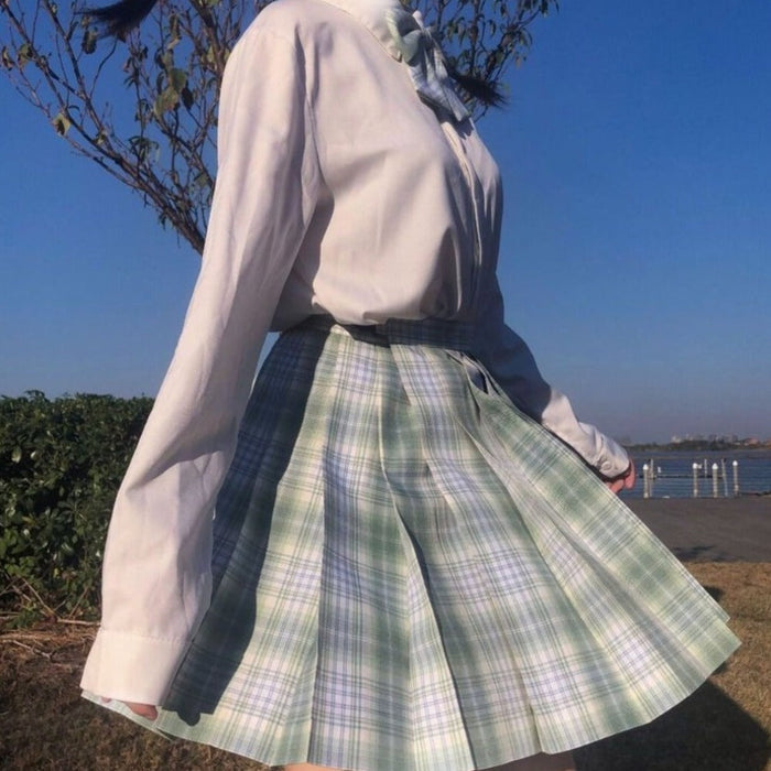 Checkered Skirt with Anime Girl Theme: white, navy blue outfit, school-uniform-inspired, preppy style