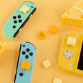 Cheese Switch Thumb Grips: Add Personality!: yellow, mint green cheese theme, playful cartoon style