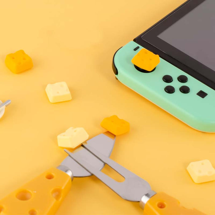 Cheese Switch Thumb Grips: Add Personality!: yellow, mint green cheese theme, playful cartoon style
