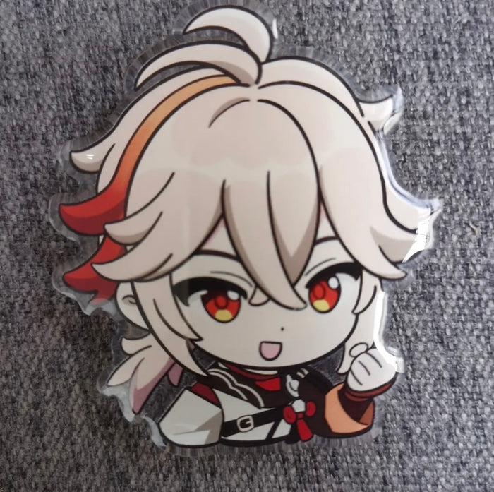 Chibi Genshin Impact Phone Holders: orange, red anime-style orange-haired character with a red oni mask, kawaii anime chibi s