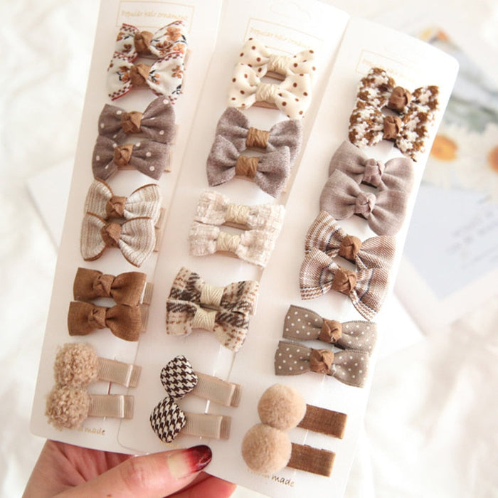 Chic Hair Bow Pins in Neutral Tones: beige, brown hair accessory set on display cards, cute, soft neutral, vintage-inspired s