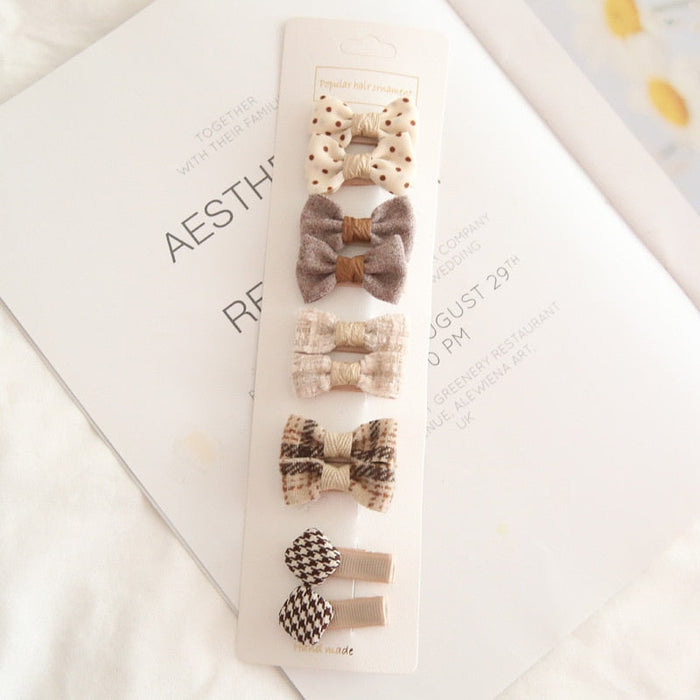 Chic Hair Bow Pins in Neutral Tones: beige, brown hair accessory set on display cards, cute, soft neutral, vintage-inspired s