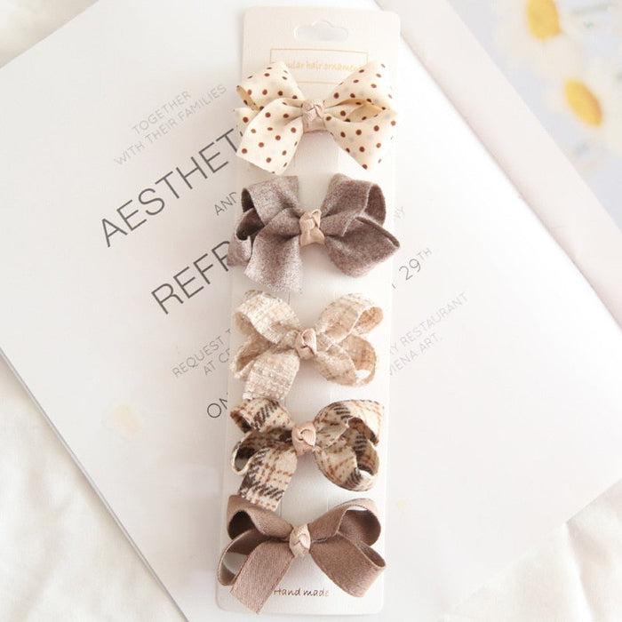 Chic Hair Bow Pins in Neutral Tones: beige, brown hair accessory set on display cards, cute, soft neutral, vintage-inspired s