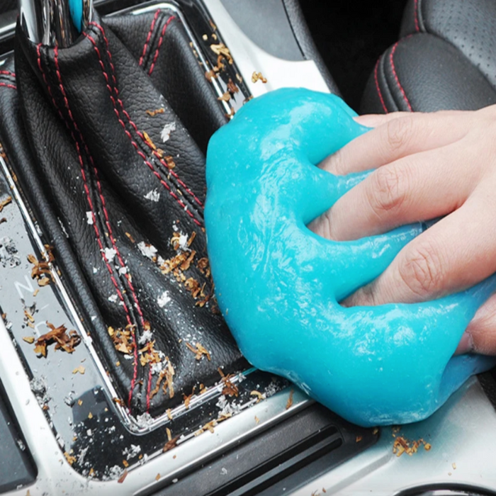 Cleaning Putty for Dust Removal: white, bright blue elephant character, cartoon, playful style