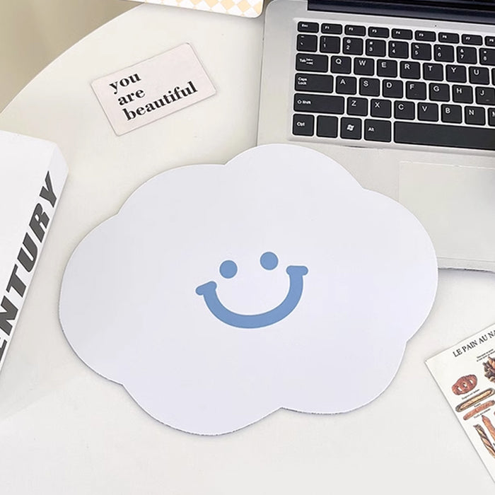 Cloud Mouse Pad: Whimsical, Compact, Durable: light blue, white smiling cloud character, cute cartoon style