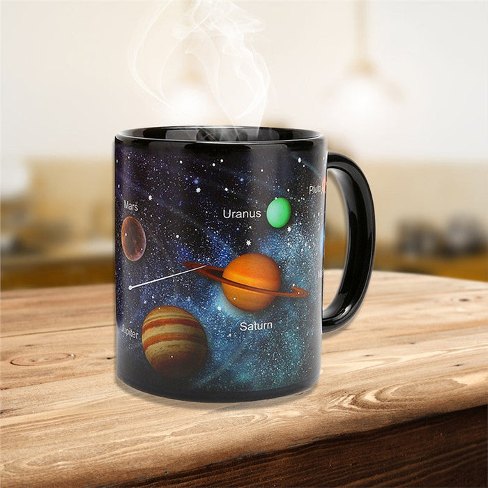 Color Changing Ceramic Mug with a Celestial Twist: black, dark blue solar system planets, colorful educational space illustra
