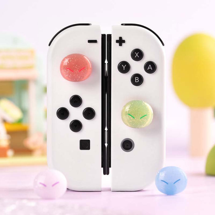 Cute Glittering Slime Joystick Caps: white, black pair of game controller grips/controllers, cute, colorful gaming accessory