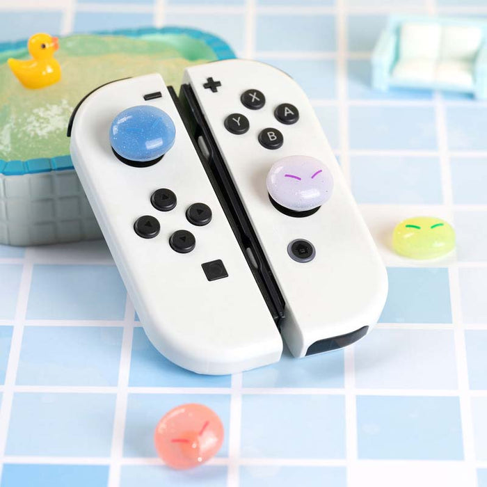 Cute Glittering Slime Joystick Caps: white, black pair of game controller grips/controllers, cute, colorful gaming accessory