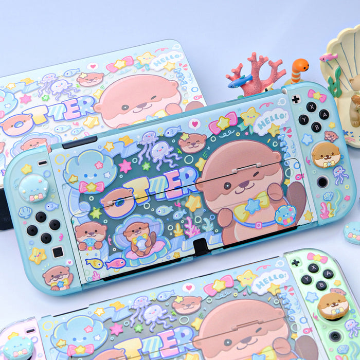 Cute Otter Switch Thumb Grips, Compatible: light blue, pink cute animal characters and sea-themed icons, kawaii cartoon style