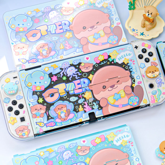 Cute Otter Switch Thumb Grips, Compatible: light blue, pink cute animal characters and sea-themed icons, kawaii cartoon style
