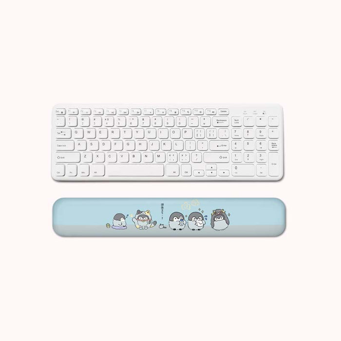 Cute Penguin Mouse Mat with Wrist Rests: light blue rounded rectangular cushion or pillow, minimal style