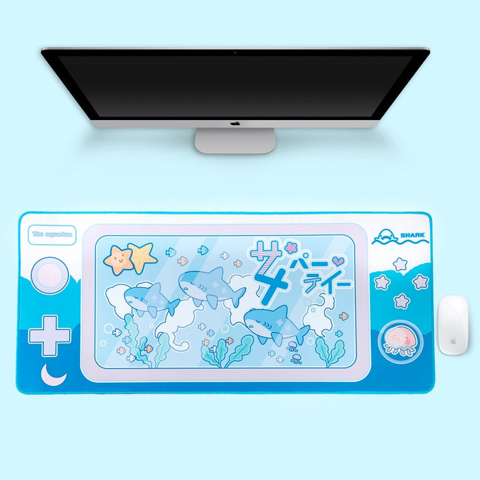 Cute Shark Gaming Desk Mat with Ocean Vibes: cyan blue, white cartoon sharks and sea-themed characters, kawaii cartoon style