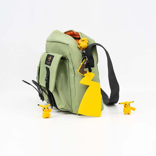 "Cute Tail Keychain: Electrifying Cuteness Accessory": yellow, brown Pikachu character theme, cartoon character, kawaii style