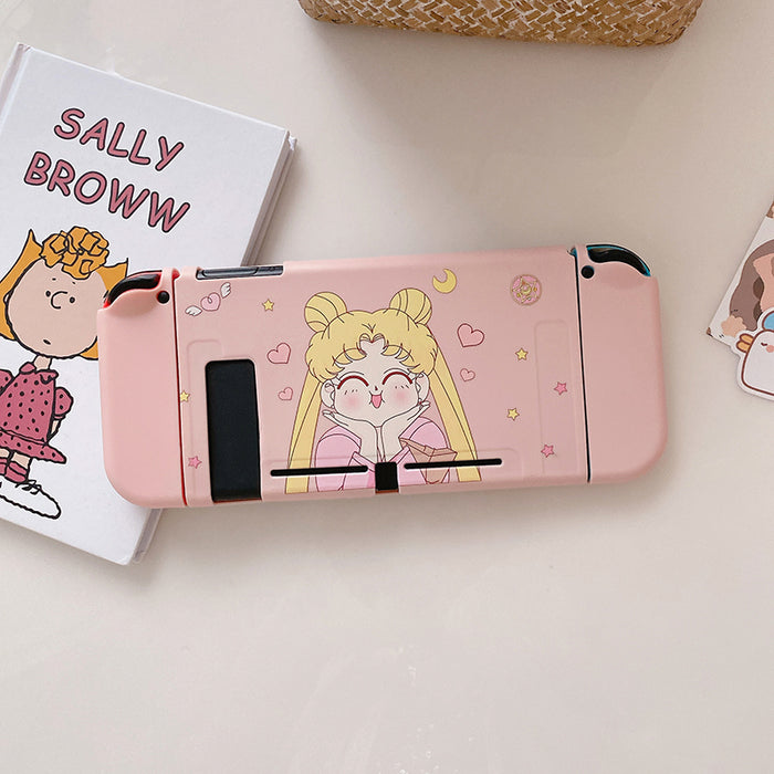 Cute Usagi Switch OLED Protective Case: pink, black Sailor Moon-inspired anime girl character, kawaii cartoon style
