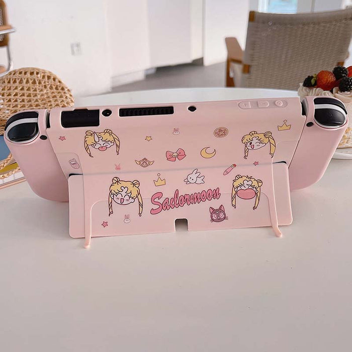 Cute Usagi Switch OLED Protective Case: pink, black Sailor Moon-inspired anime girl character, kawaii cartoon style