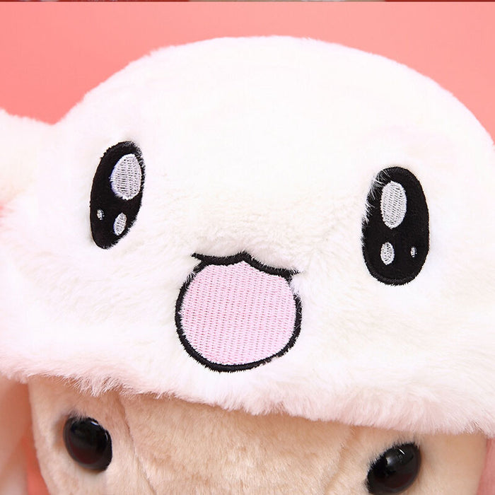 Dancing Bunny Hat with Moving Ears: white, light beige bear wearing a bunny hat, kawaii cartoon style