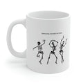 Dancing Skeletons Mug: white, black three dancing skeleton characters, cartoon graphic style
