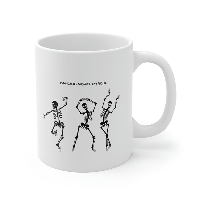 Dancing Skeletons Mug: white, black three dancing skeleton characters, cartoon graphic style