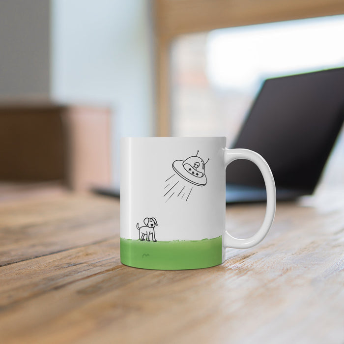 Dog Being Abducted by UFO Mug: white, green cartoon alien spaceship and dog, minimal cartoon style
