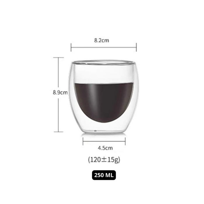 Double Wall Glass Cup that is Resistant to Heat: clear, dark brown double-walled drinking glass with dark beverage, minimal s
