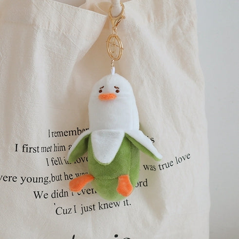 Duckana Plush Keychains: Cute and Comfy!: white, light green duck character, cute cartoon style